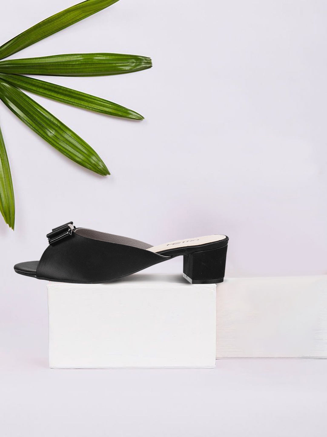 

Metro Women Black Solid Mules