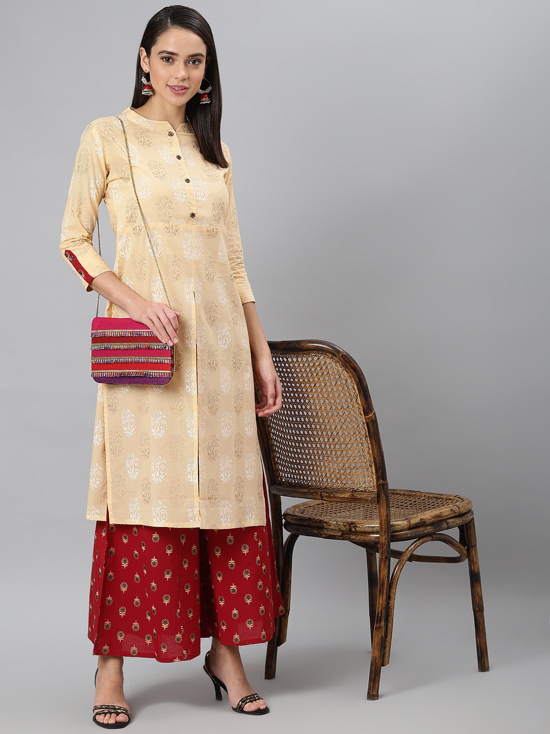 

Khushal K Women Beige & Red Printed Kurta with Palazzos