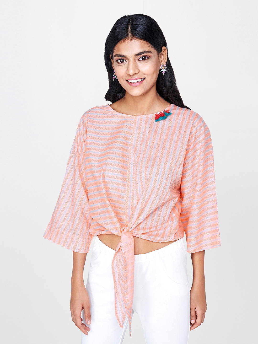 

Global Desi Women Peach-Coloured & Turquoise Blue Printed Cinched Waist Pure Cotton Top