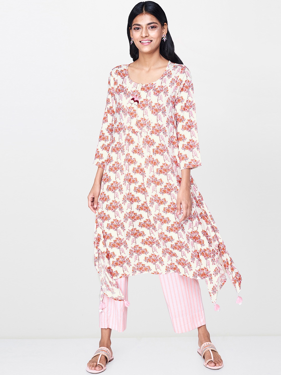 

Global Desi Women Off-White & Pink Printed Asymmetric Hemline A-Line Kurta