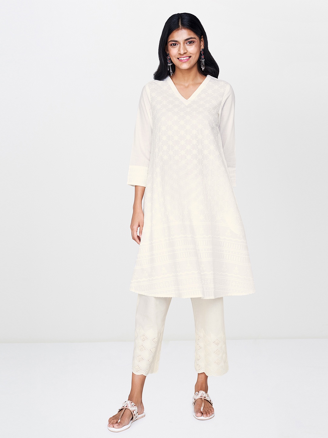 

Global Desi Women White Embroidered A-Line Kurta