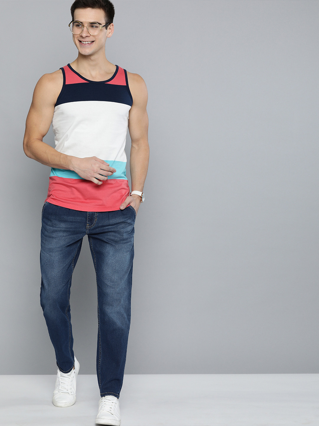 

Mast & Harbour Men Blue Carrot Regular Fit Clean Look Stretchable Pleated Front Jeans