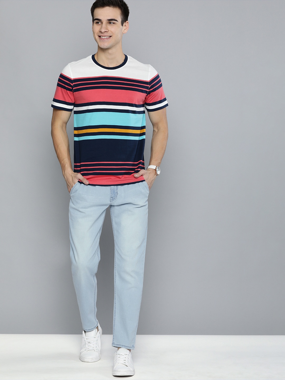 

Mast & Harbour Men Blue Carrot Fit Mid-Rise Clean Look Stretchable Jeans