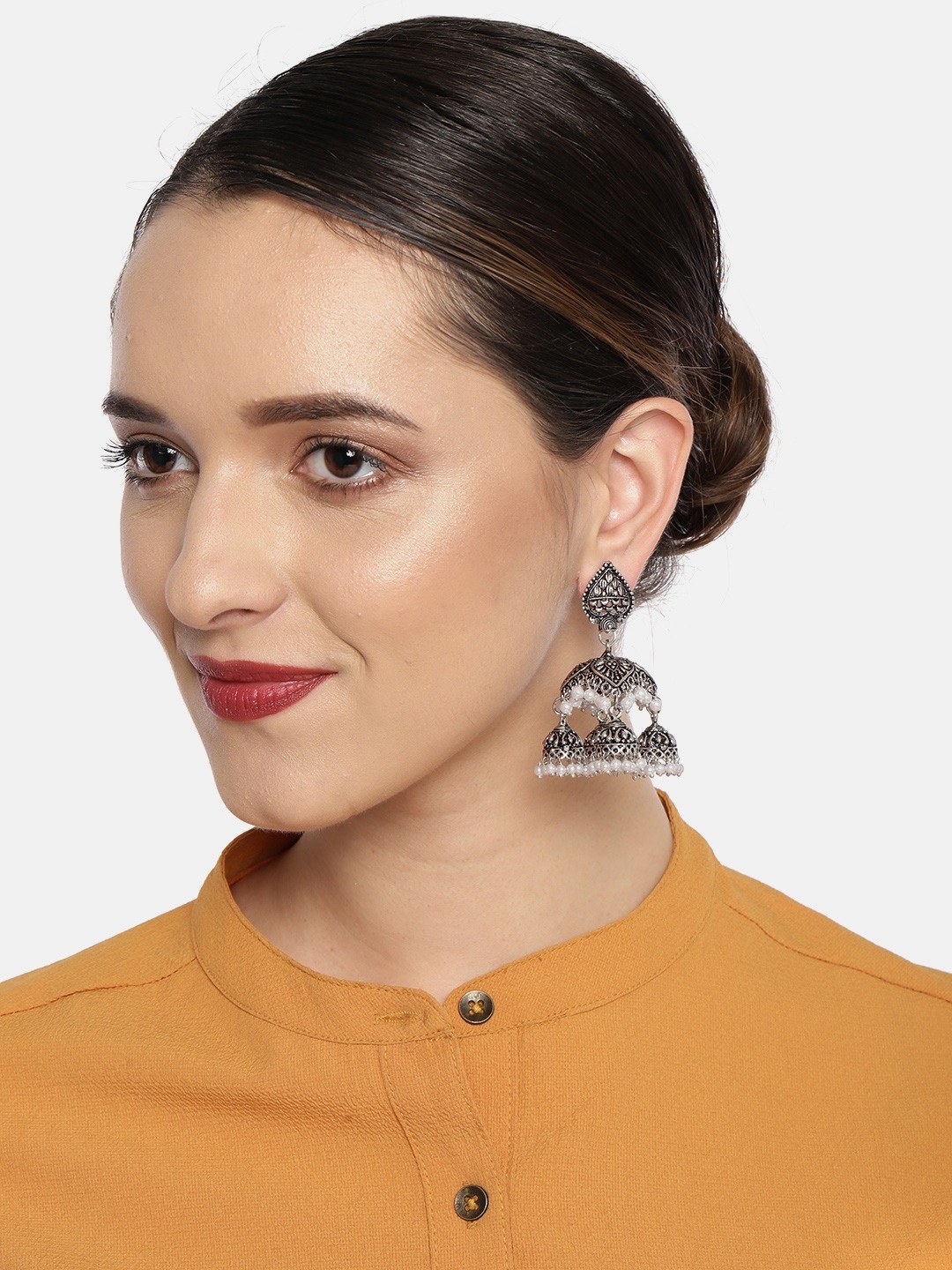 

Fida Silver-Toned Oxidised Dome Shaped Jhumkas
