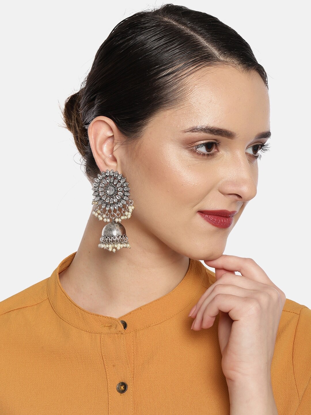 

Fida Silver-Toned Dome Shaped Jhumkas