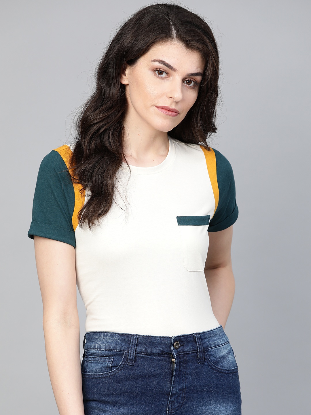 

Roadster Women Off-White Solid Round Neck T-shirt