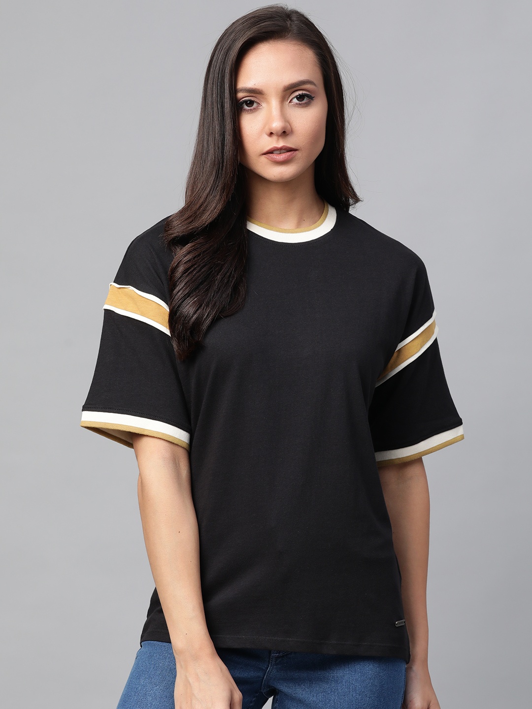 

Roadster Women Black Solid Round Neck T-shirt