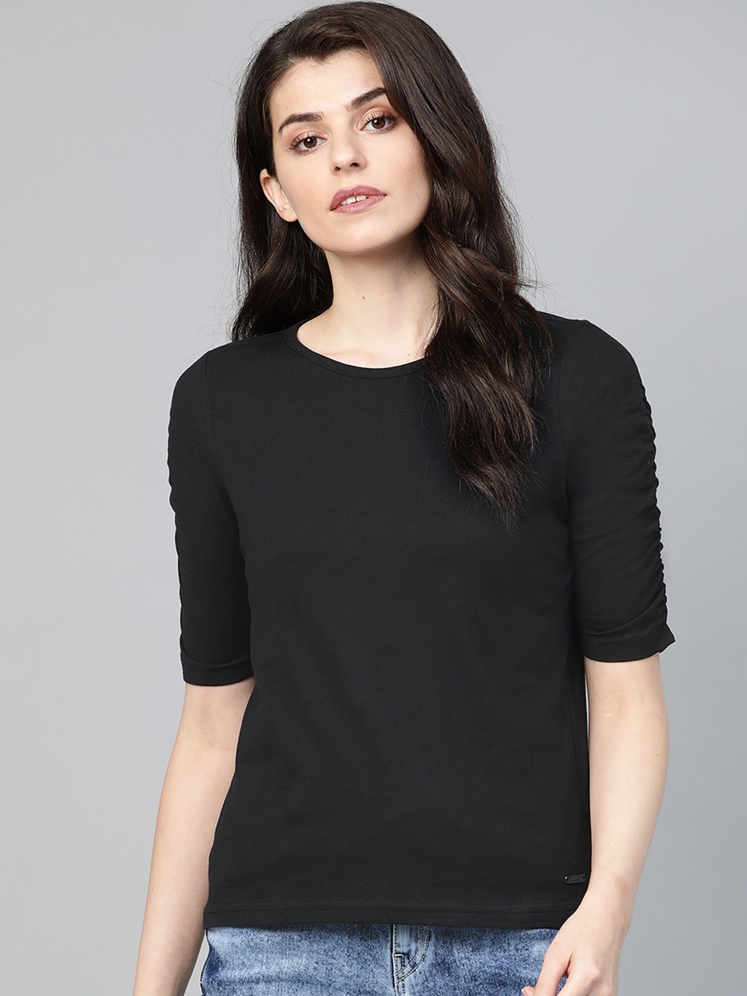 

Roadster Women Black Solid Round Neck T-shirt