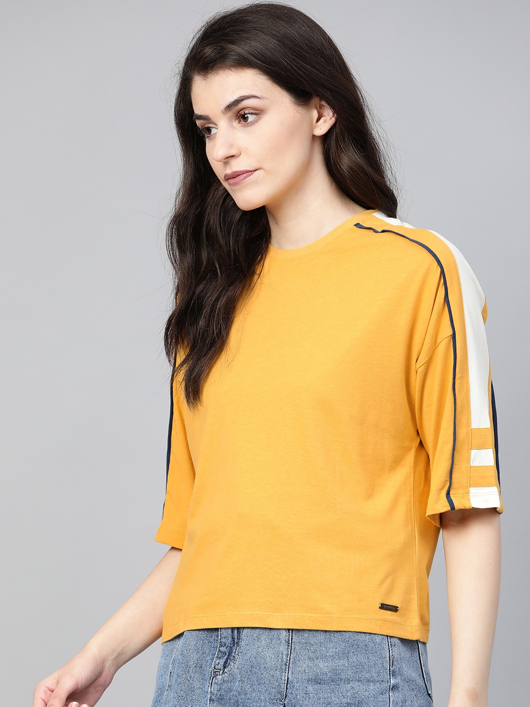 

Roadster Women Mustard Yellow Solid Round Neck T-shirt