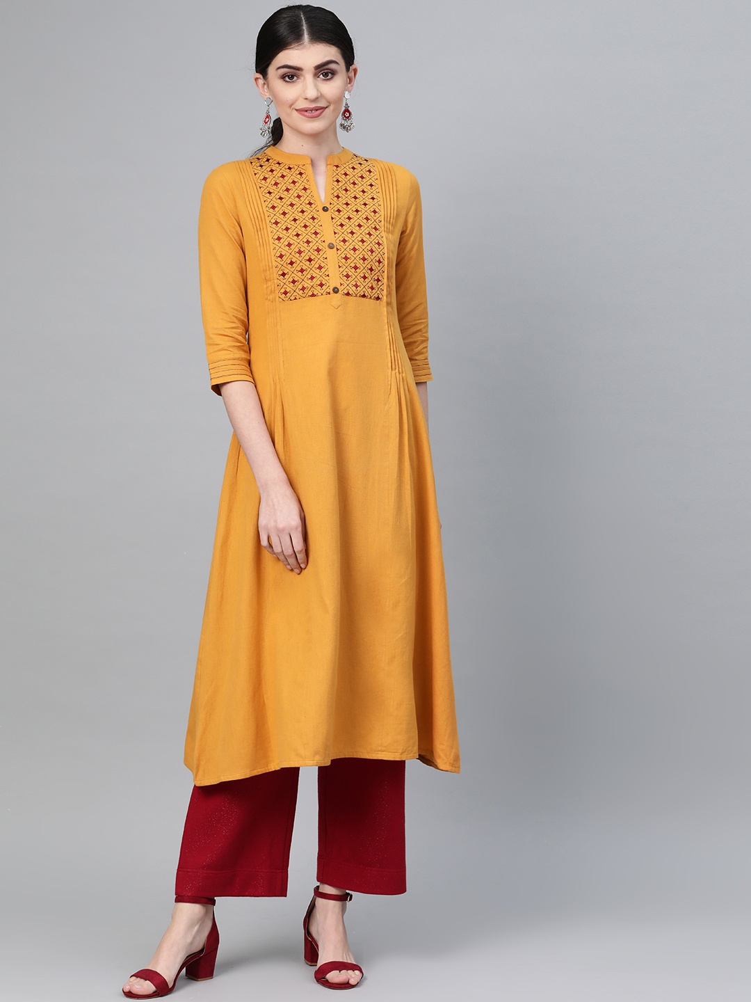 

Varanga Women Mustard Yellow & Maroon Yoke Design A-Line Kurta