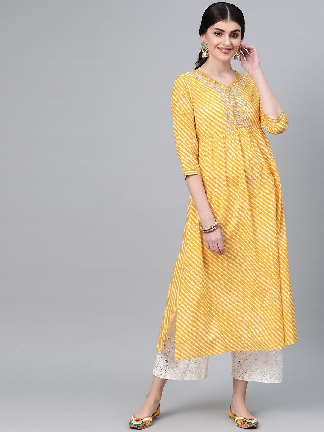 

Varanga Women Yellow & Off White Leheriya Print A-Line Kurta