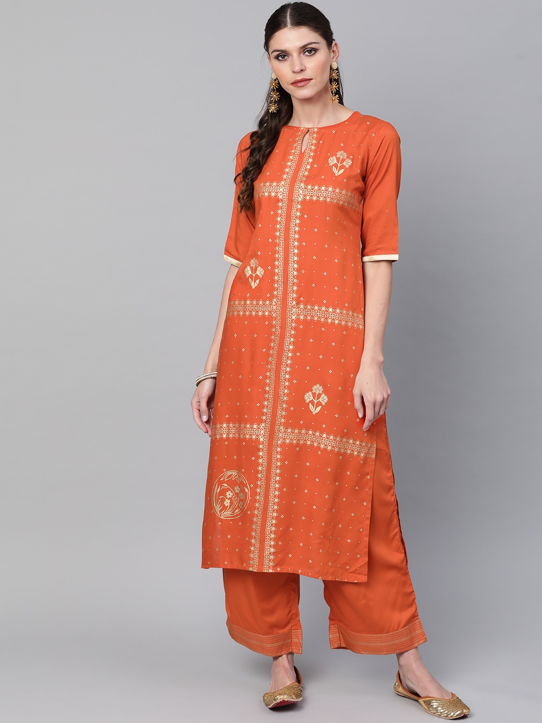 

Libas Women Rust Orange & Golden Block Print Kurta with Palazzos