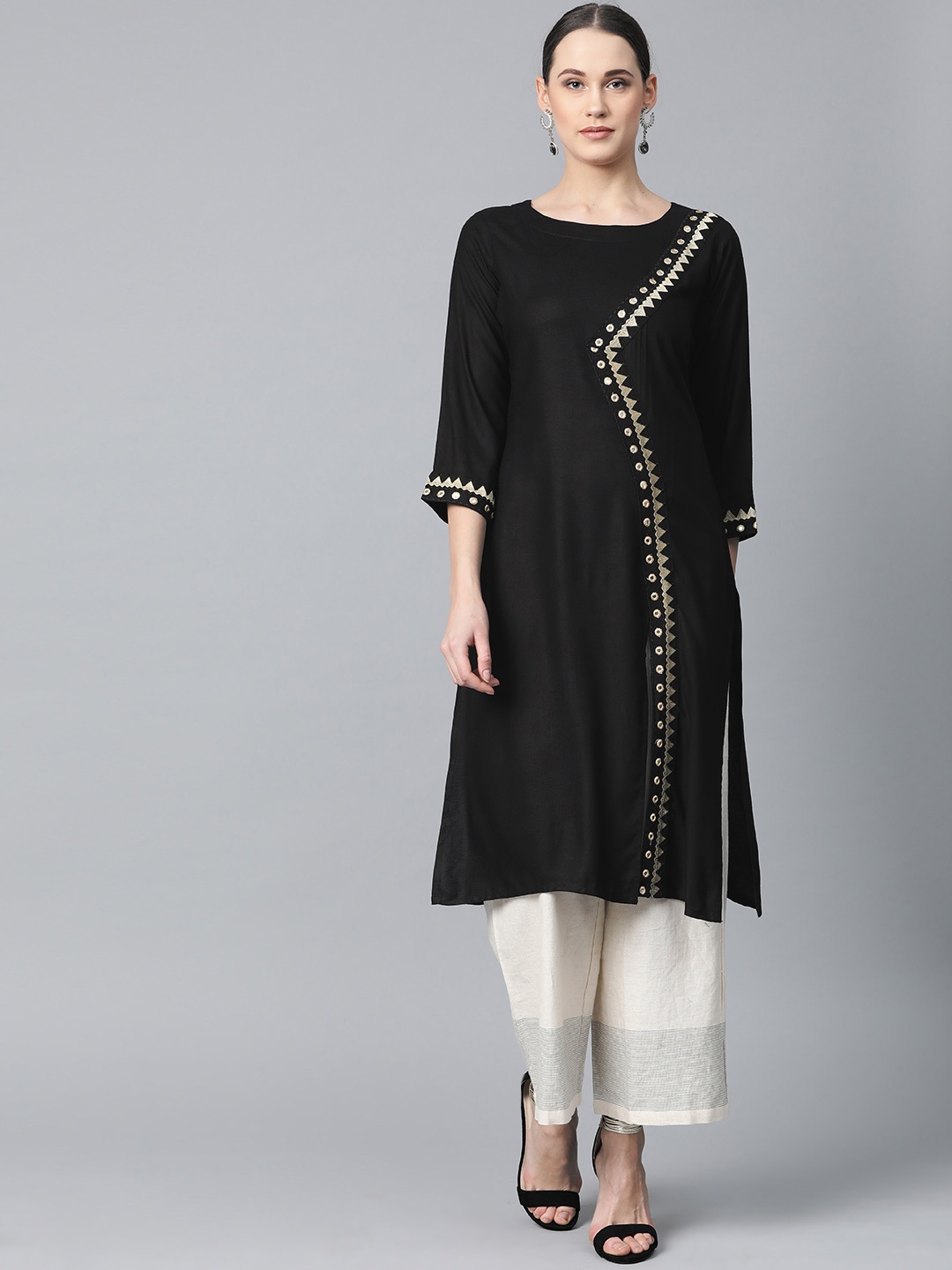 

Jompers Women Black Solid Straight Kurta