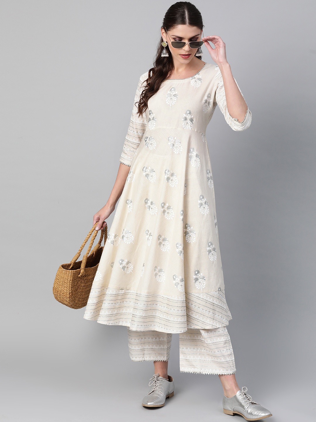 

Libas Women Off-White & Silver Printed Kurta with Palazzos
