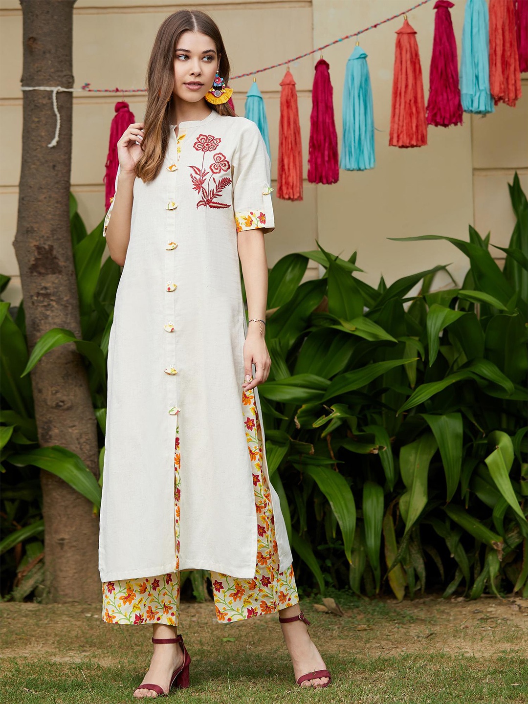 

Pannkh Women Beige & Orange Solid Kurta with Palazzos