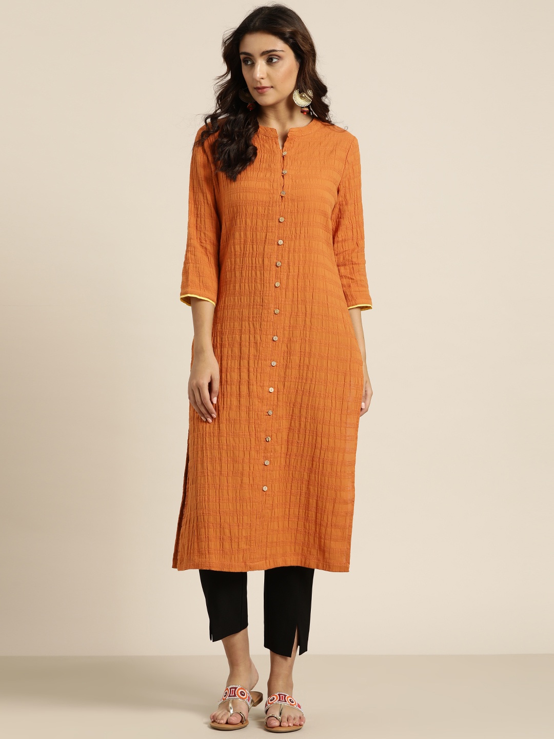 

Moda Rapido Women Rust Orange Woven Design Straight Kurta
