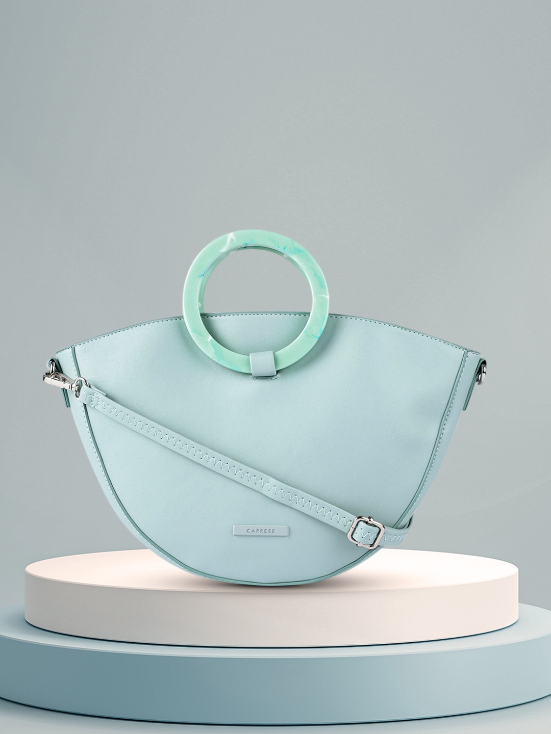 

Caprese Blue EDWINA Solid Handheld Bag