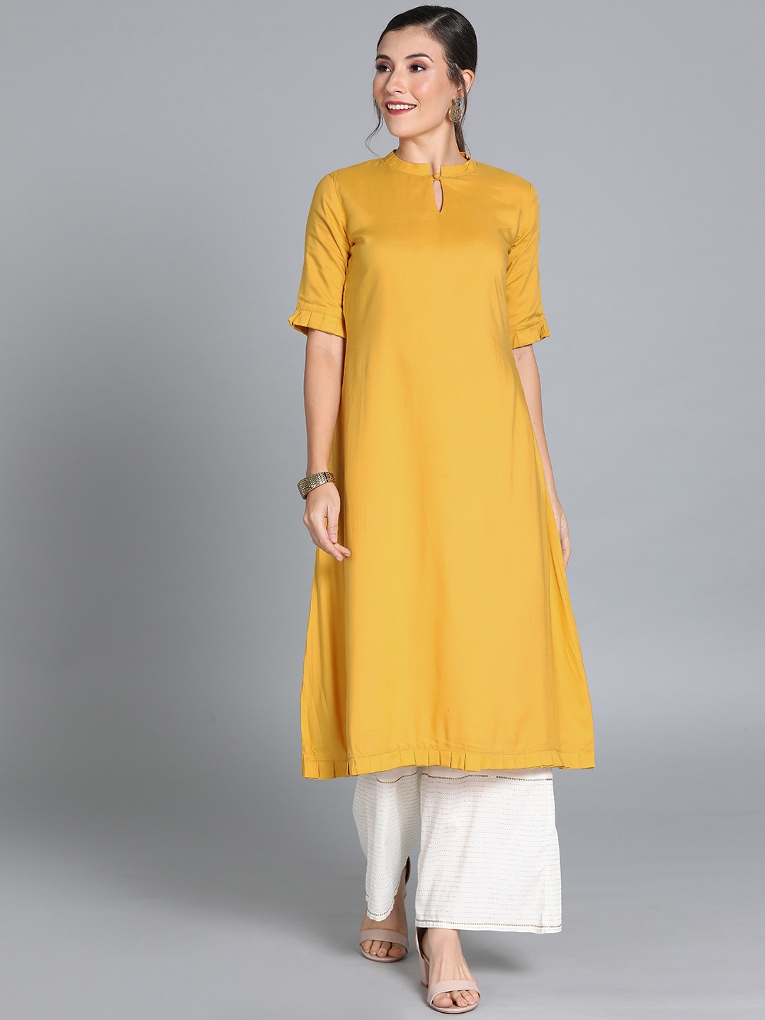 

Ethnovog Women Mustard Yellow Solid Made To Measure A-Line Kurta