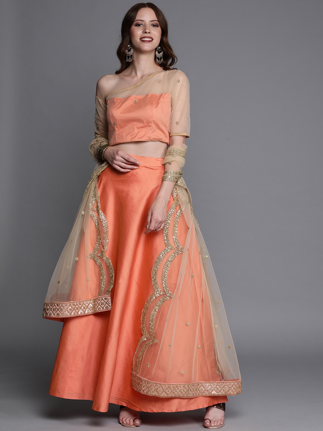 

Ethnovog Beige Peach-Coloured Solid Made to Measure Lehenga Blouse with Dupatta