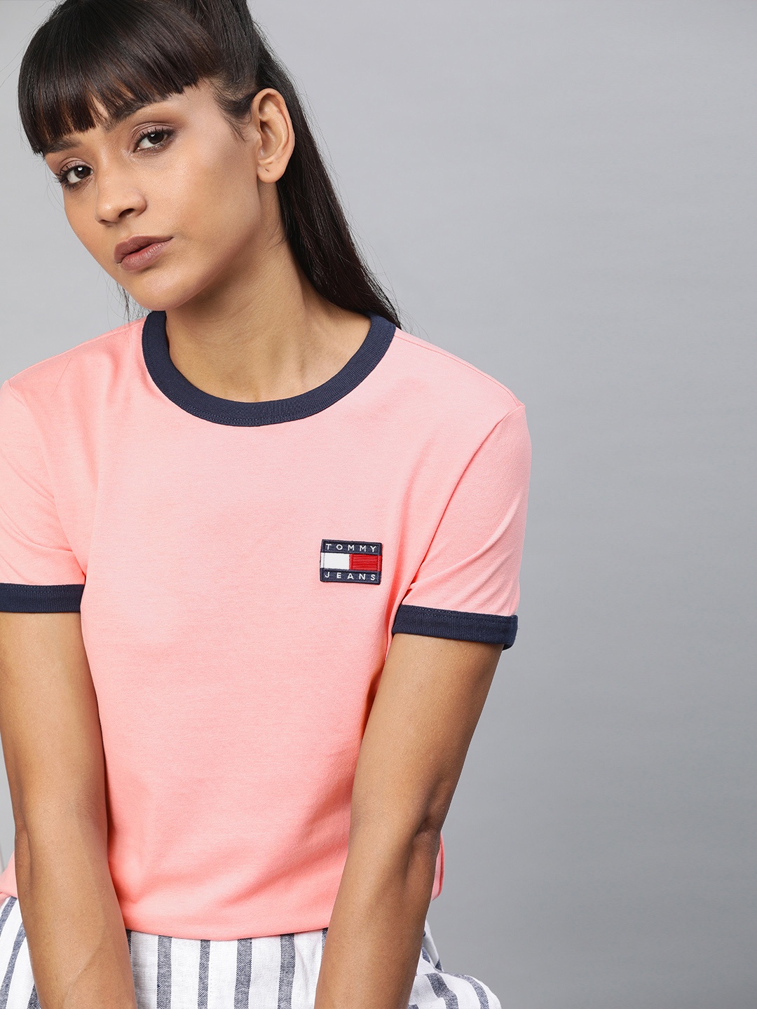 

Tommy Hilfiger Women Pink Solid Round Neck T-shirt with Applique