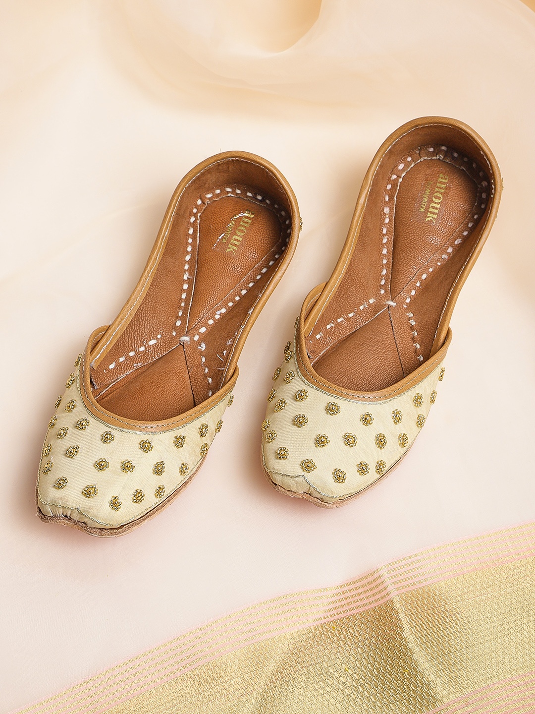 

Anouk Women Beige & Gold-Toned Embellished Mojaris
