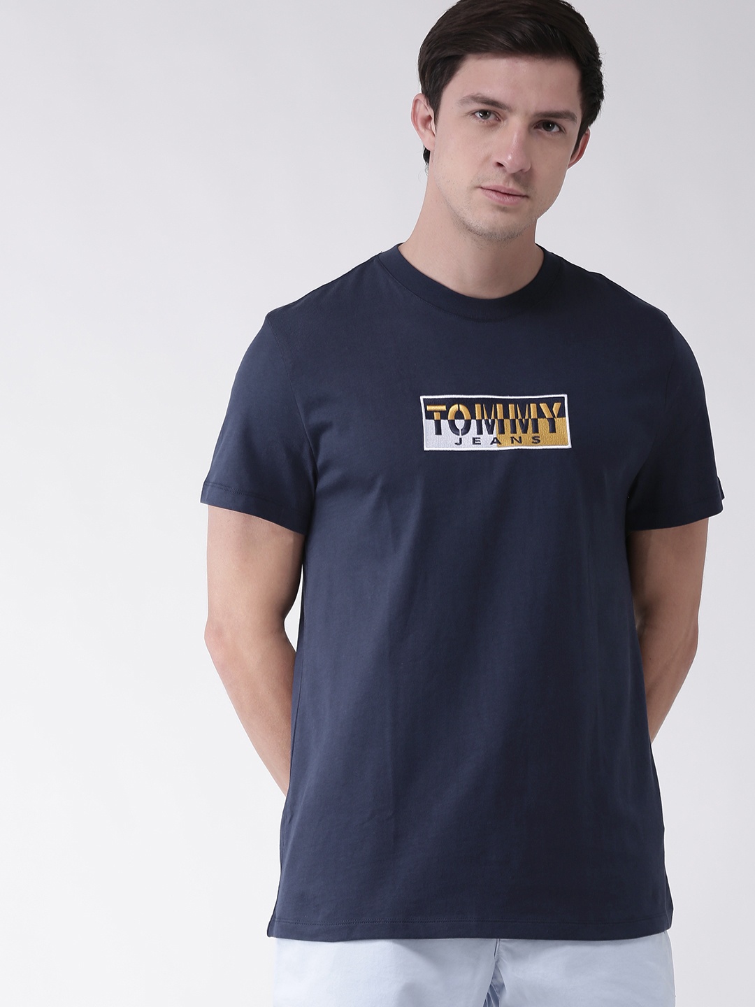 

Tommy Hilfiger Men Navy Blue Yellow Embroidered Round Neck Pure Cotton T-shirt