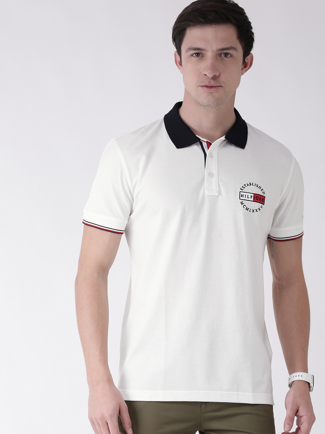 

Tommy Hilfiger Men White Solid Polo Collar T-shirt