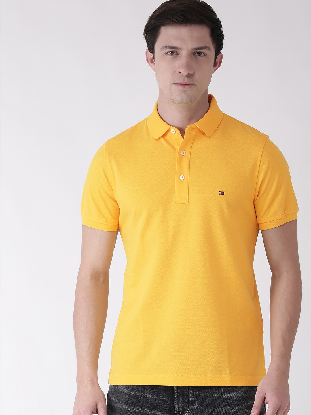 

Tommy Hilfiger Men Yellow Slim Fit Solid Polo Collar Pure Cotton T-shirt