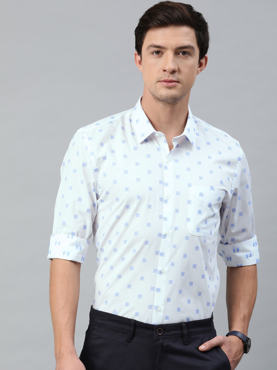 

Peter England Men White & Blue Slim Fit Self Design Semiformal Shirt