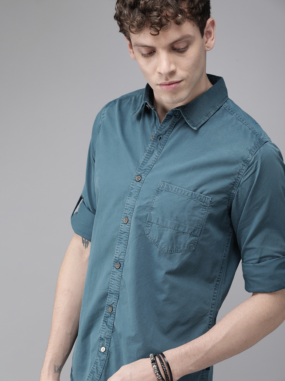 

Roadster Men Teal Blue Regular Fit Solid Casual Shirt