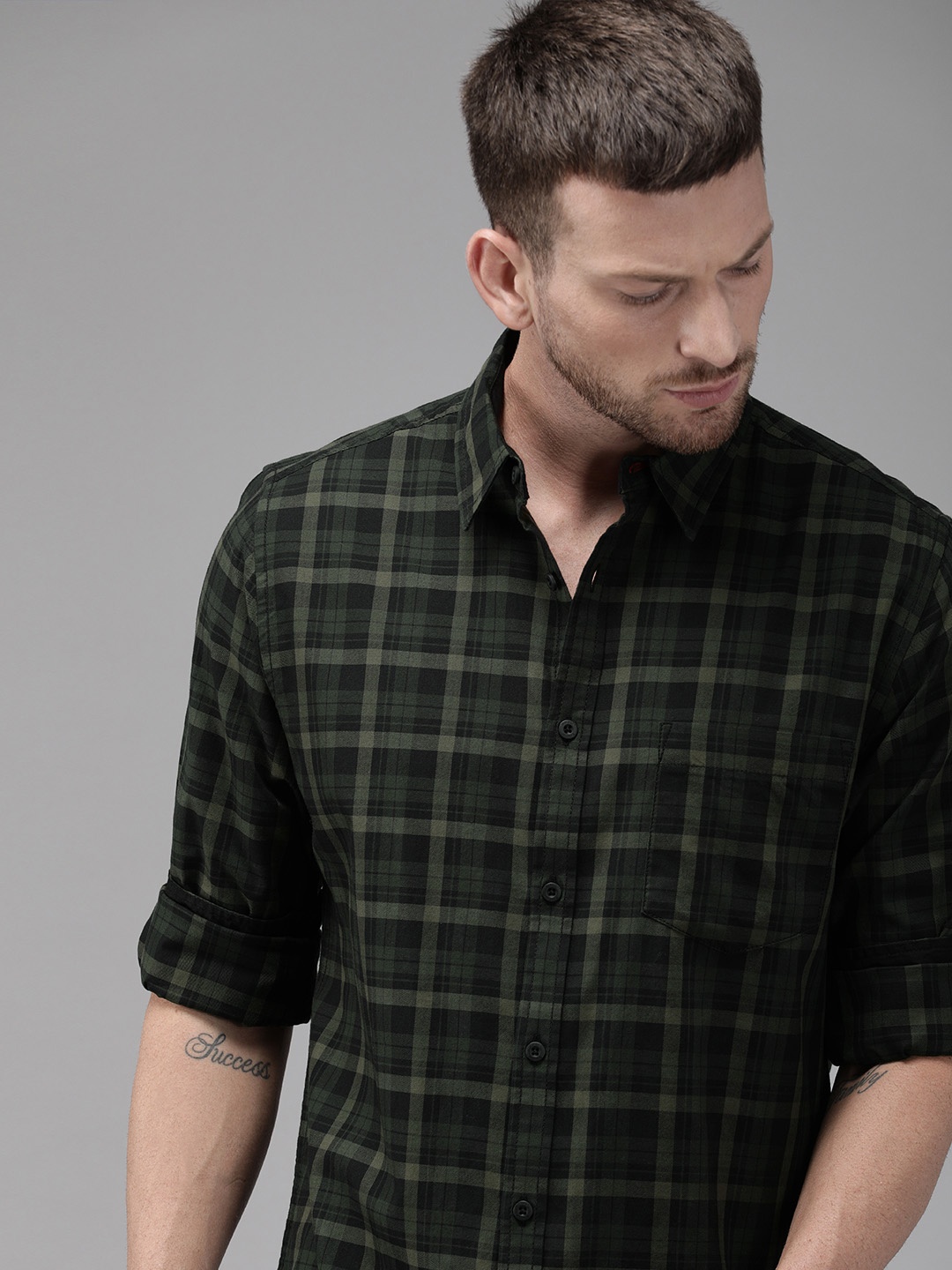 

Roadster Men Olive Green & Black Checked Casual Shirt