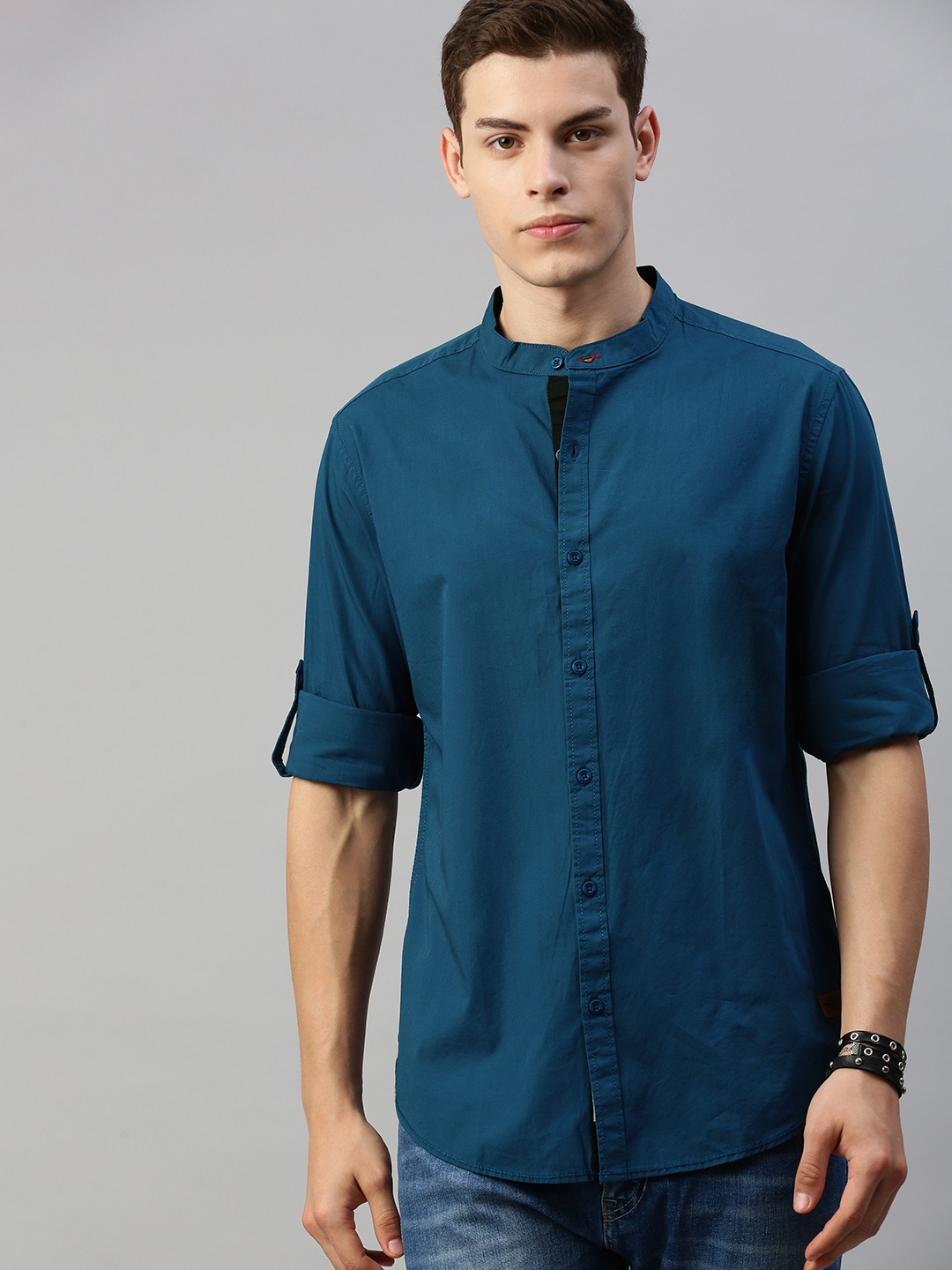

Roadster Men Teal Blue Regular Fit Solid Sustainable Casual Shirt