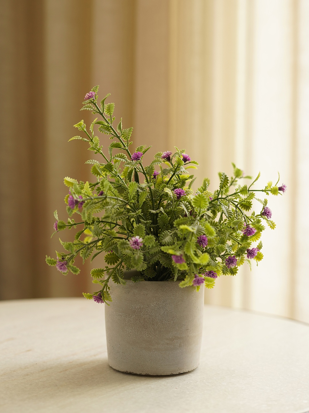 

Pure Home and Living Green & Purple Artificial Flower Plant With Pot