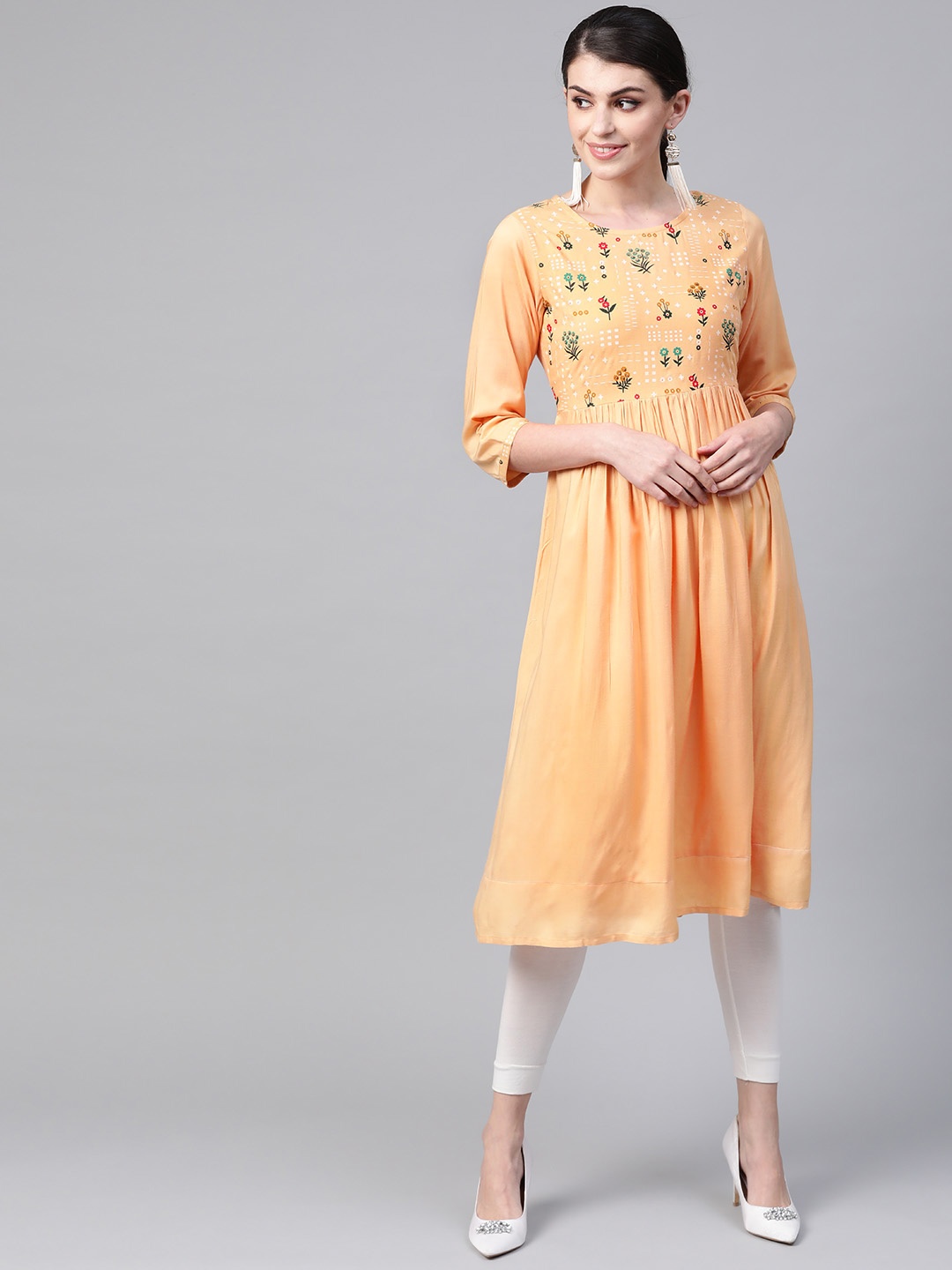 

Meeranshi Women Beige & White Yoke Desigh A-Line Kurta