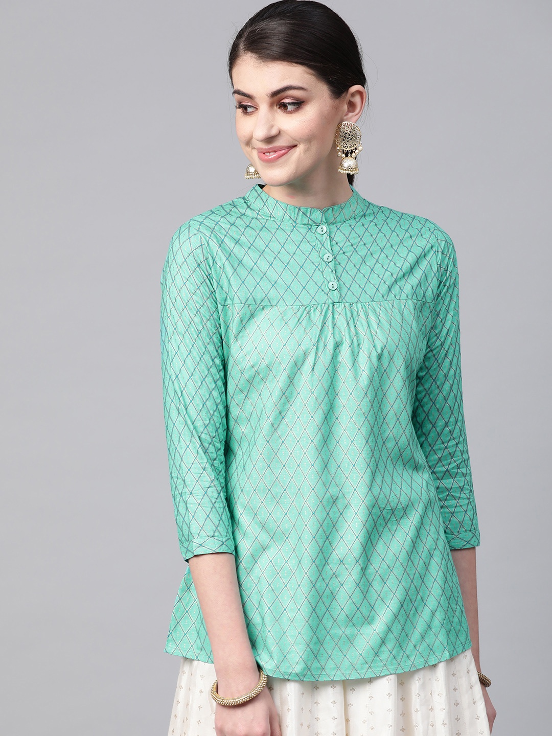 

Meeranshi Women Green & Golden Checked Kurti