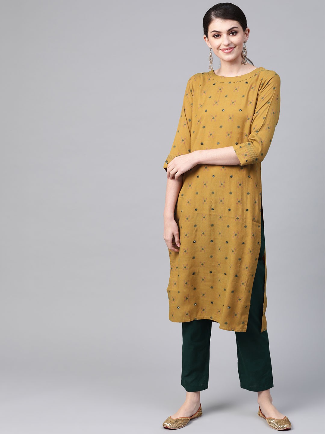 

Meeranshi Women Mustard Yellow & Green Woven Design Kurta with Trousers