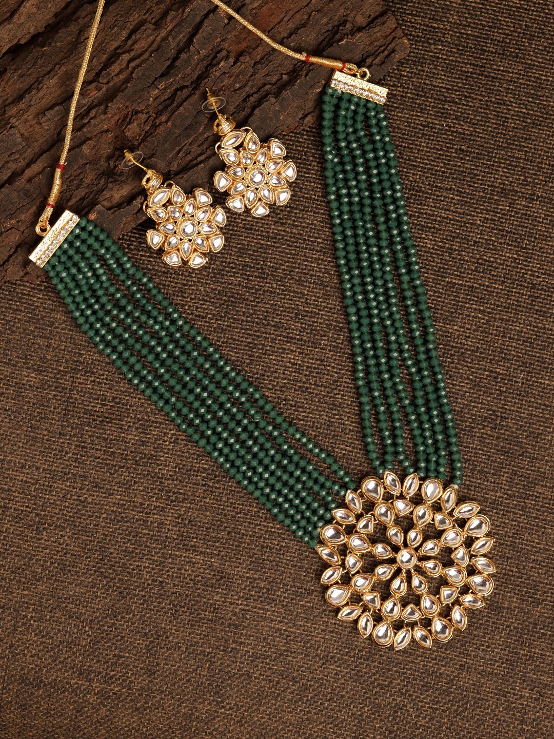 

Fabstreet Gold-Plated Green & White Kundan & Studded Beaded Handcrafted Jewellery Set