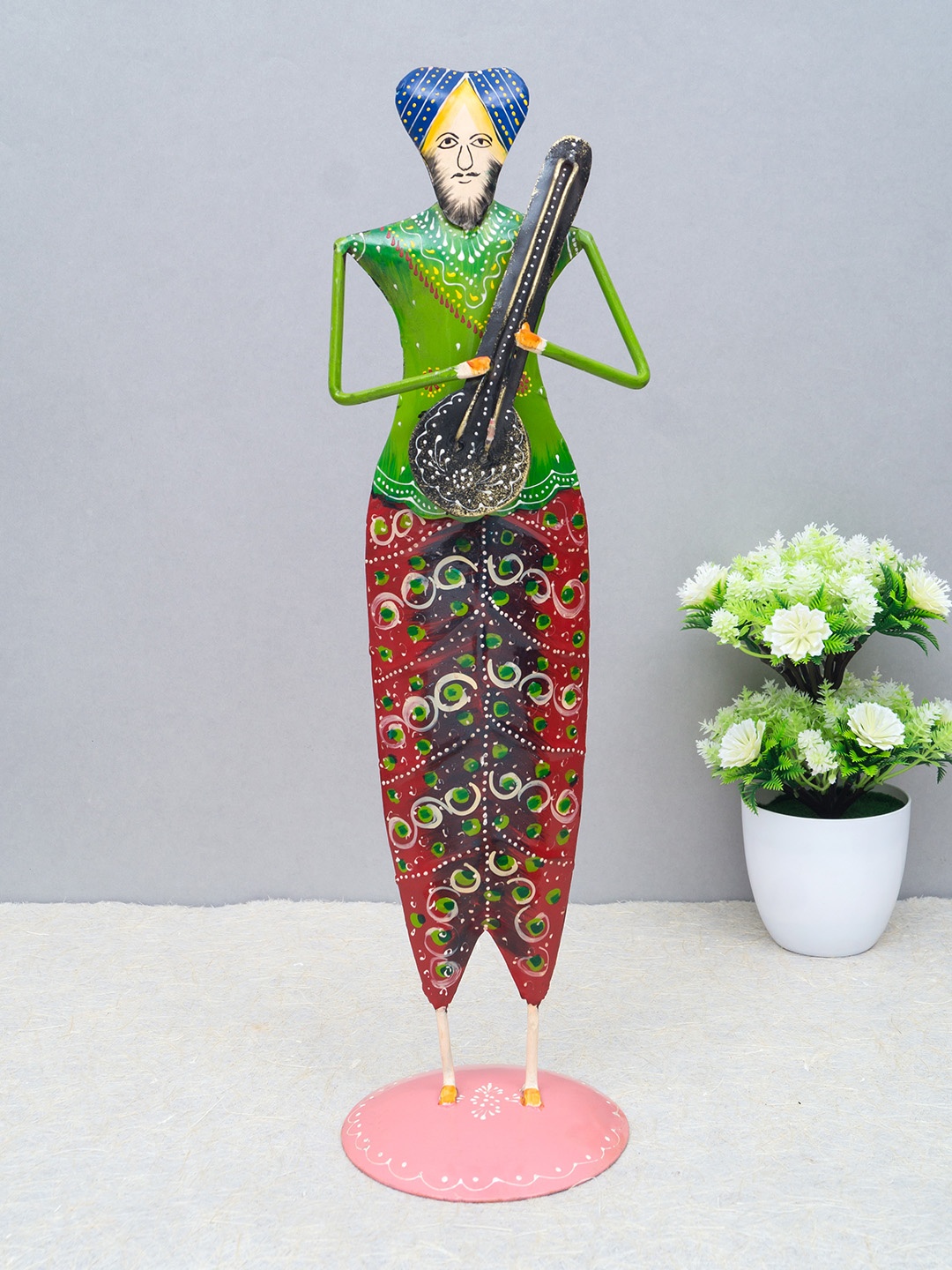 

Golden Peacock Green & Red Musician Sardar Showpiece
