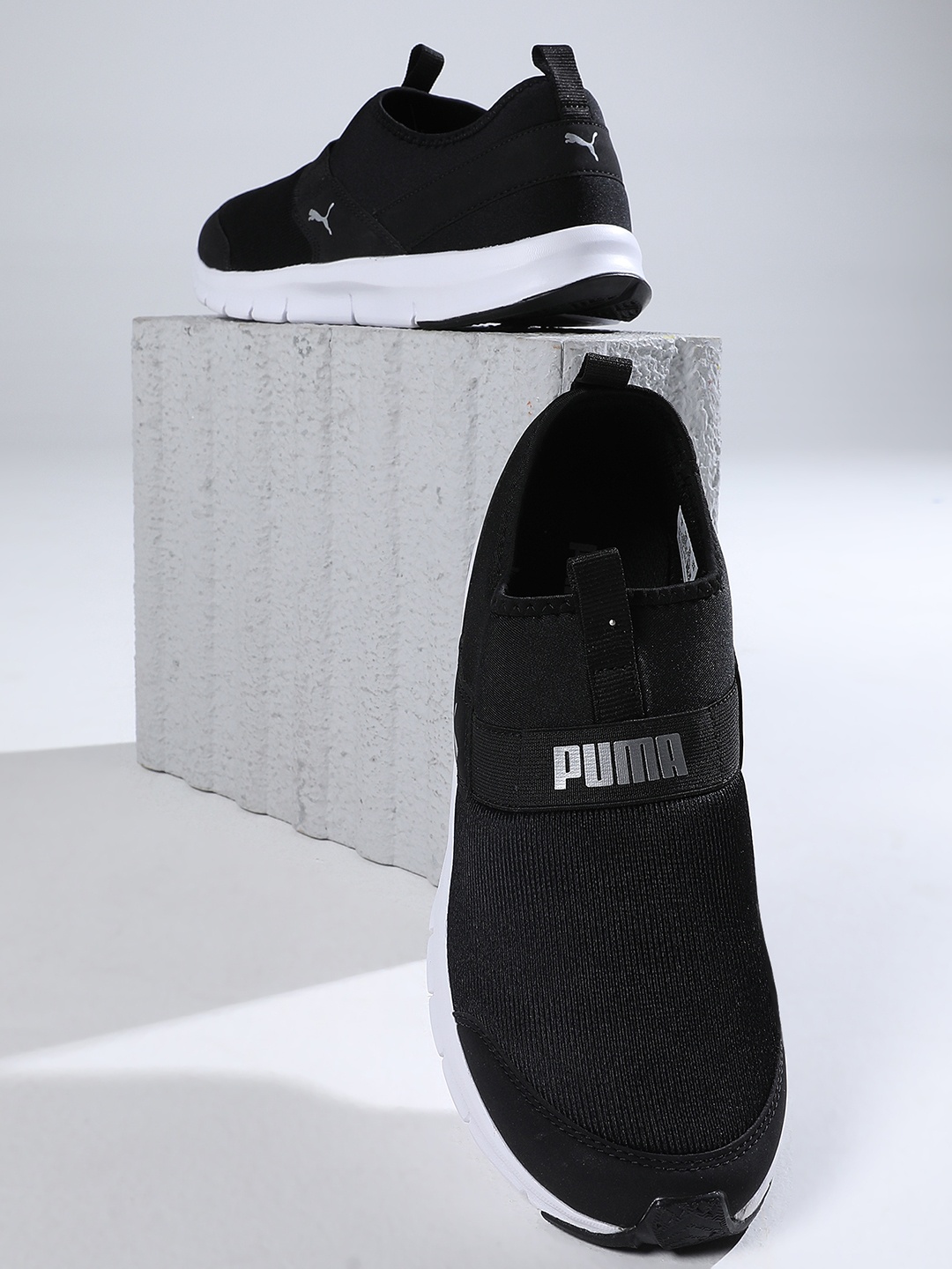 

Puma Men Black Solid Slip-On Knit Walking Shoes