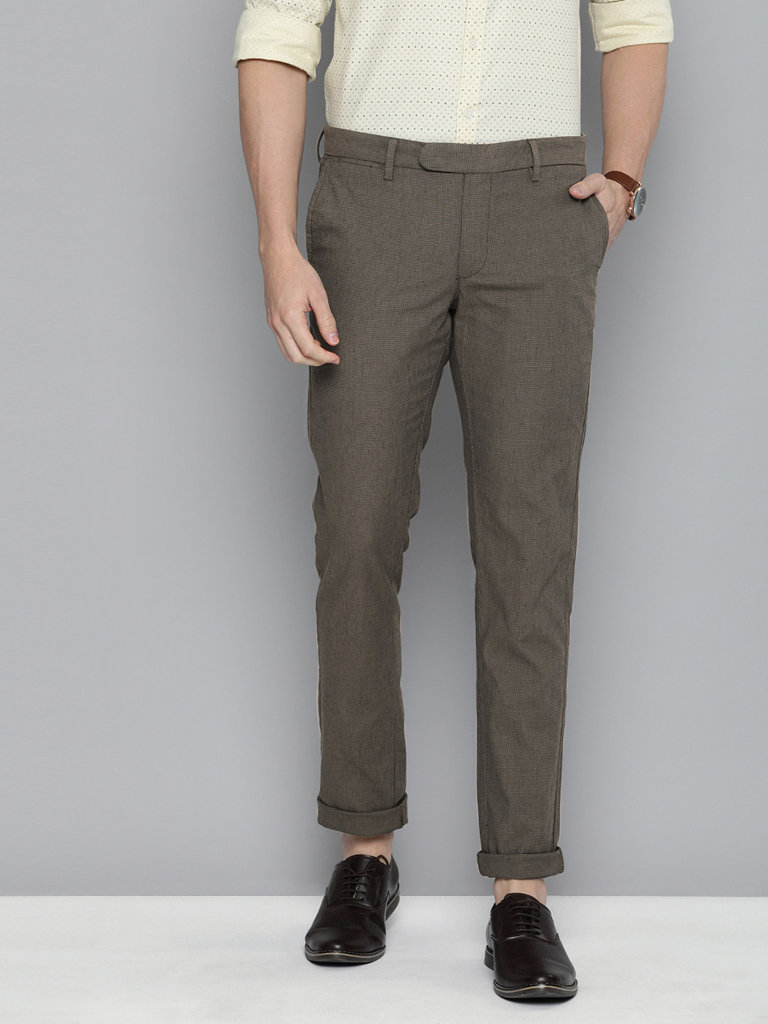

Indian Terrain Men Brown Brooklyn Slim Fit Solid Regular Trousers