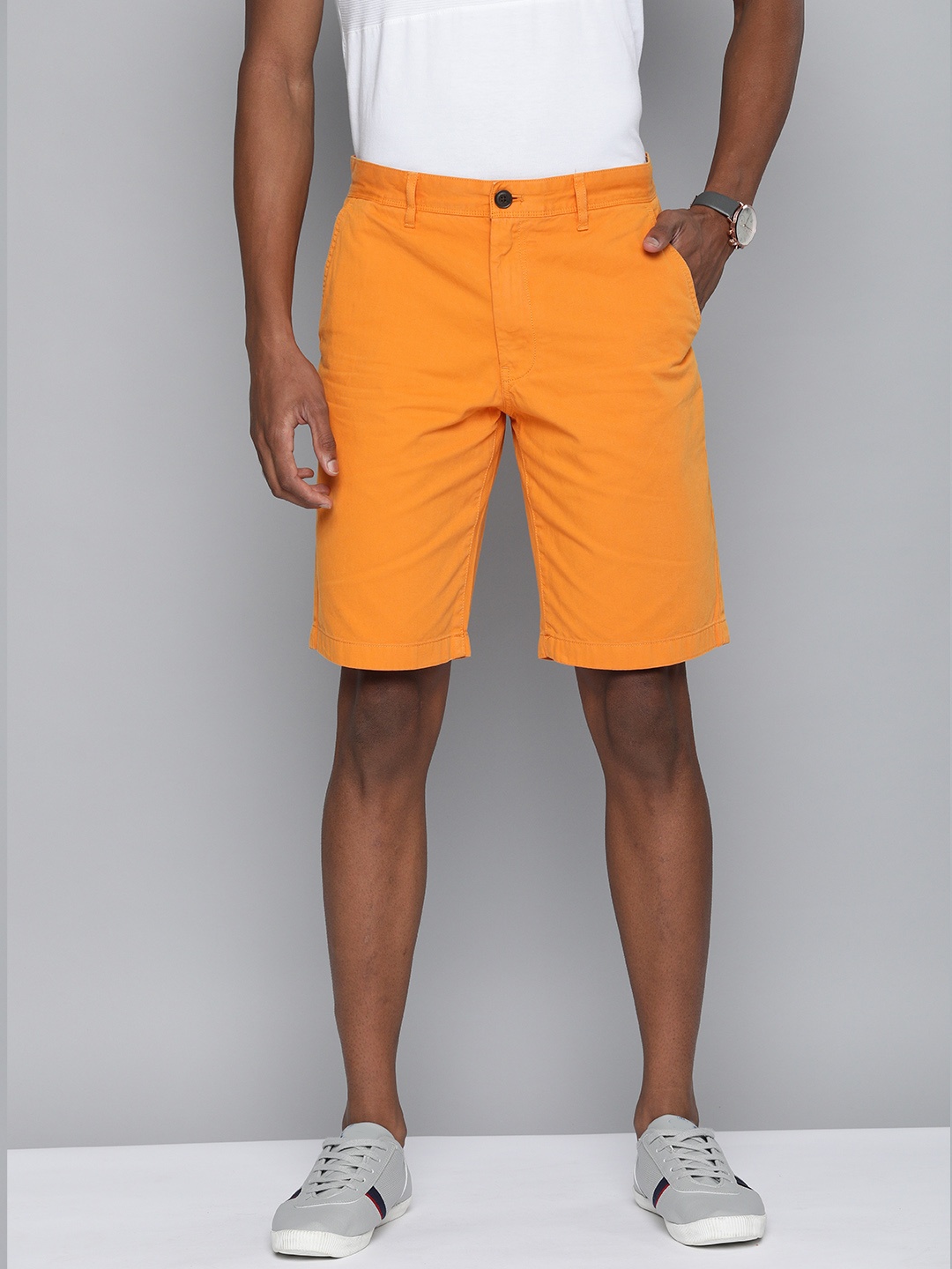 

Indian Terrain Men Yellow Solid Mid-Rise Regular Shorts