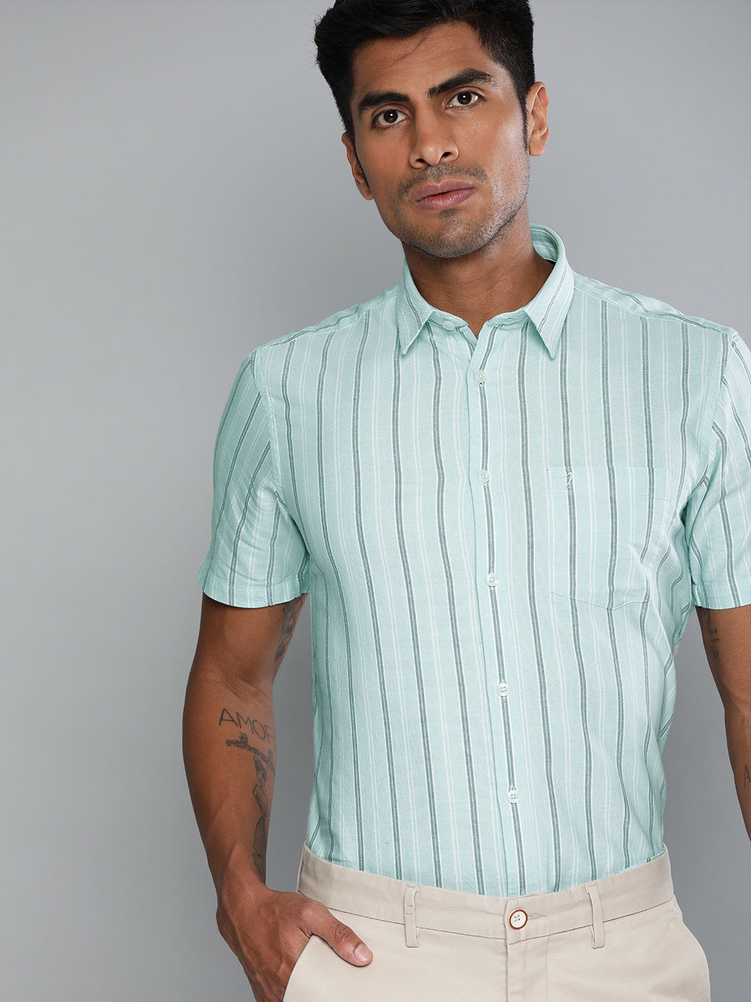 

Indian Terrain Men Sea Green & Navy Blue Slim Fit Striped Smart Casual Shirt