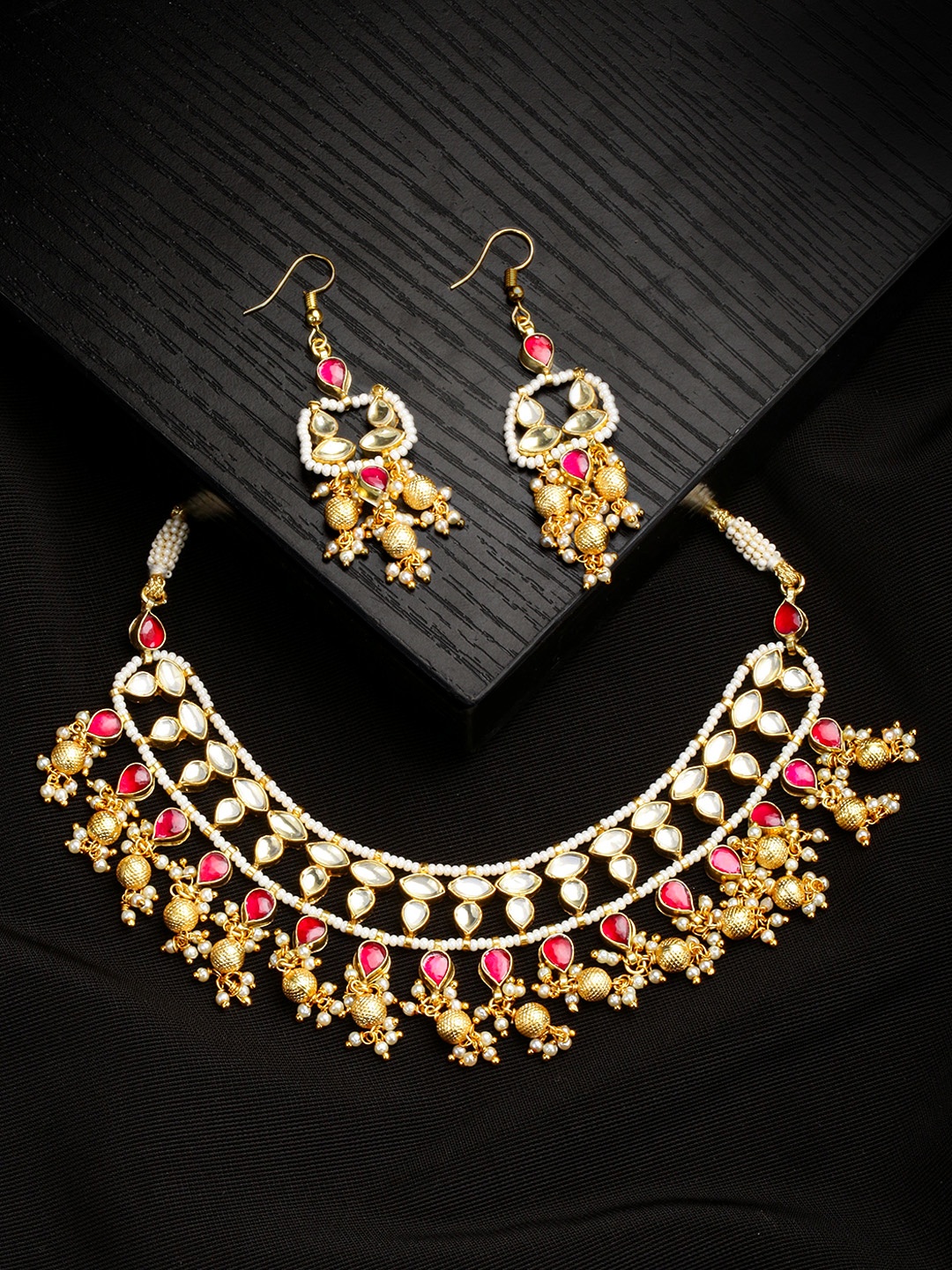 

Justpeachy Gold-Toned & Red Kundan Stone Studded Jewellery Set