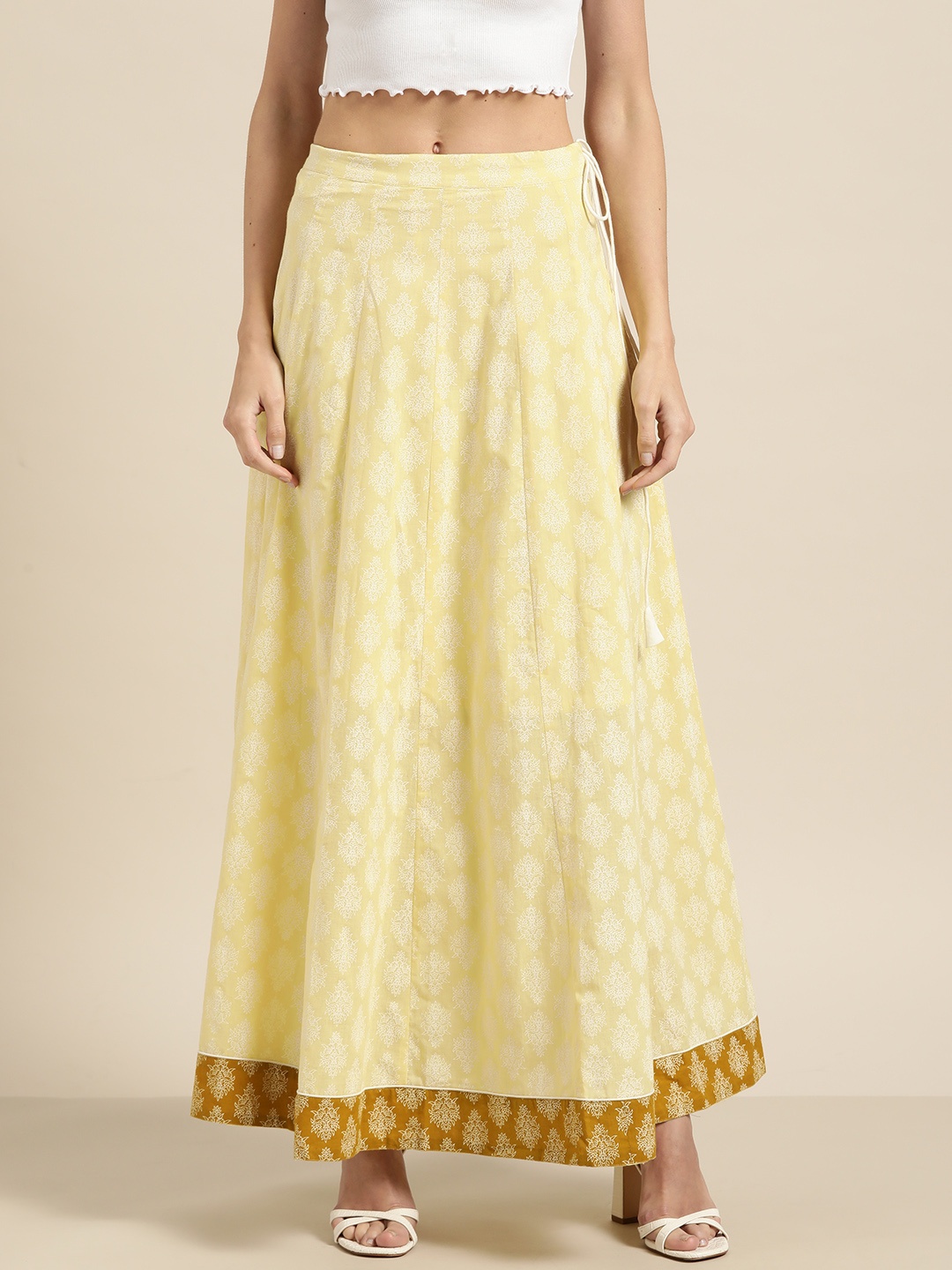 

Shae by SASSAFRAS Women Yellow & White Printed Flared Maxi Skirt