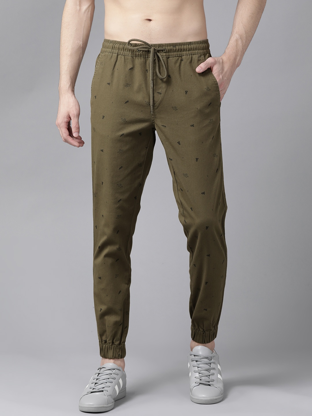 

Roadster Men Olive Green & Black Quirky Regular Fit Printed Joggers