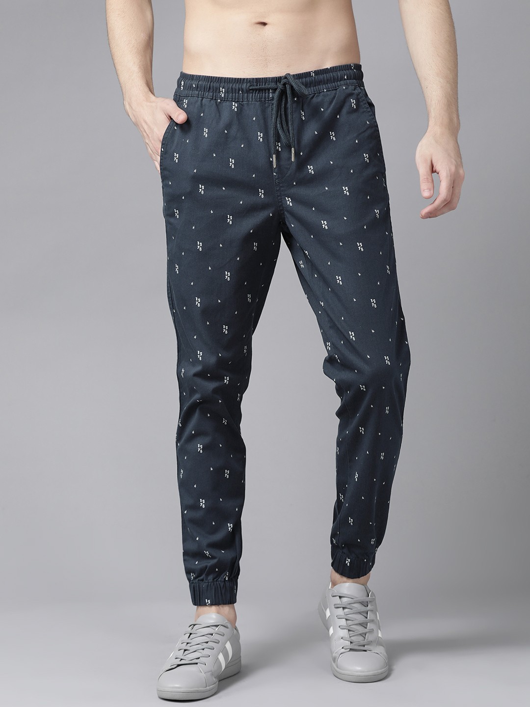 

Roadster Men Navy Blue & White Regular Fit Printed Joggers