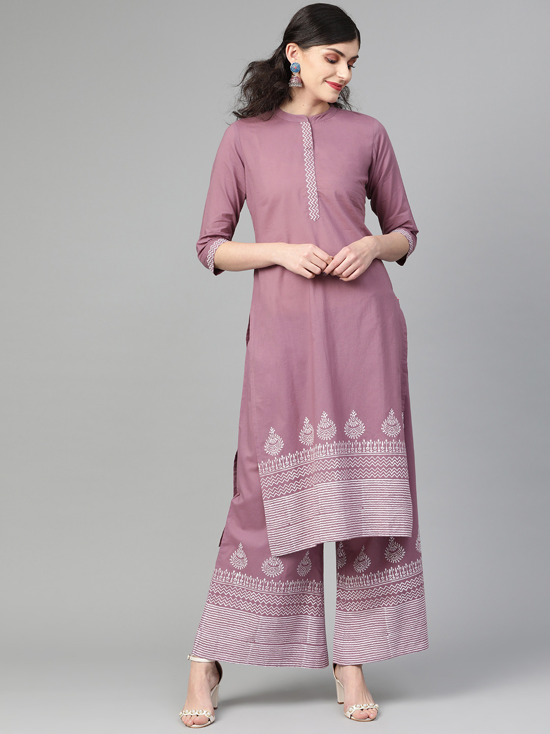 

Varanga Women Mauve & Off-White Printed Kurta with Palazzos