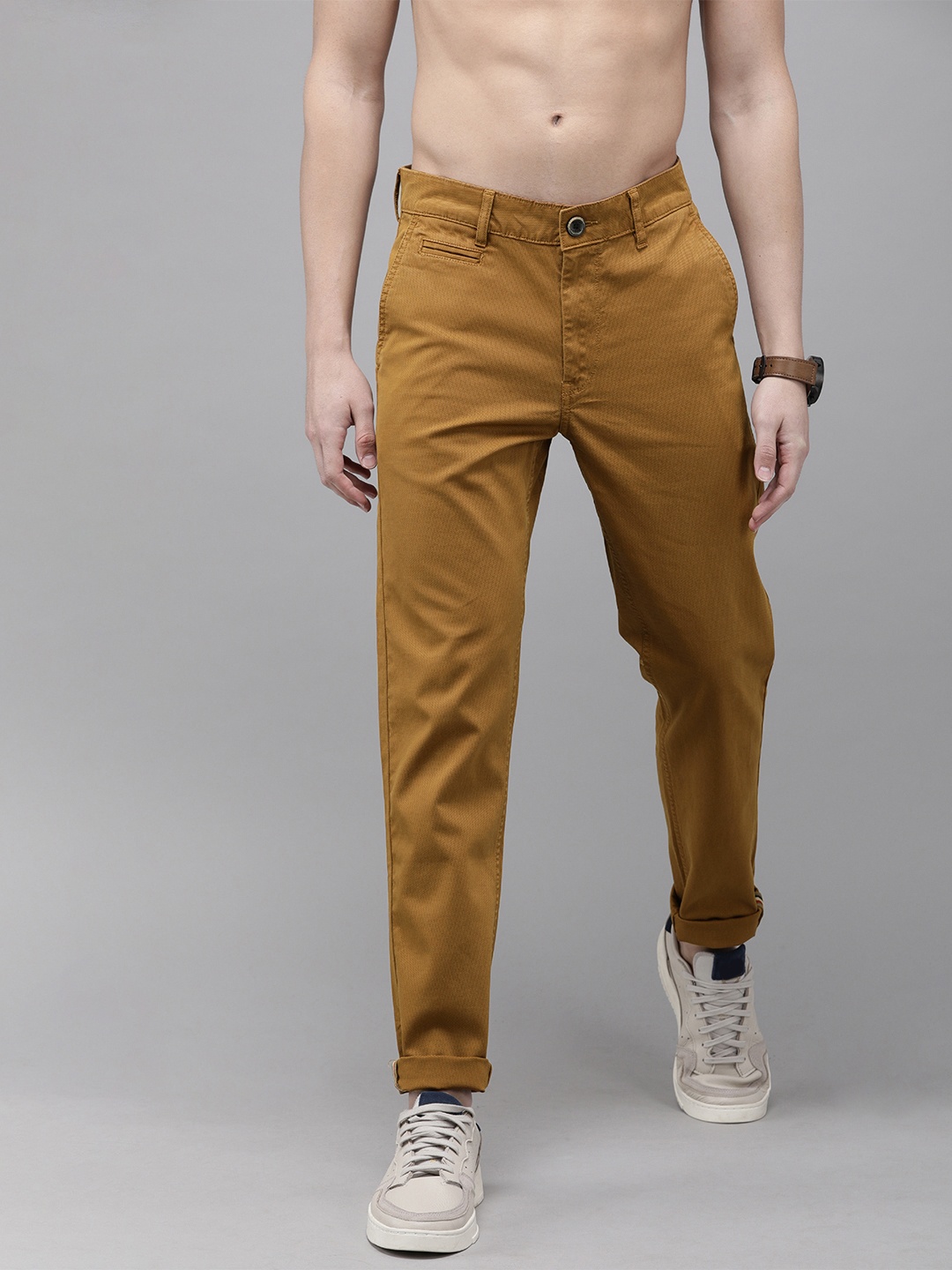 

Roadster Men Khaki Regular Fit Self Design Regular Trousers