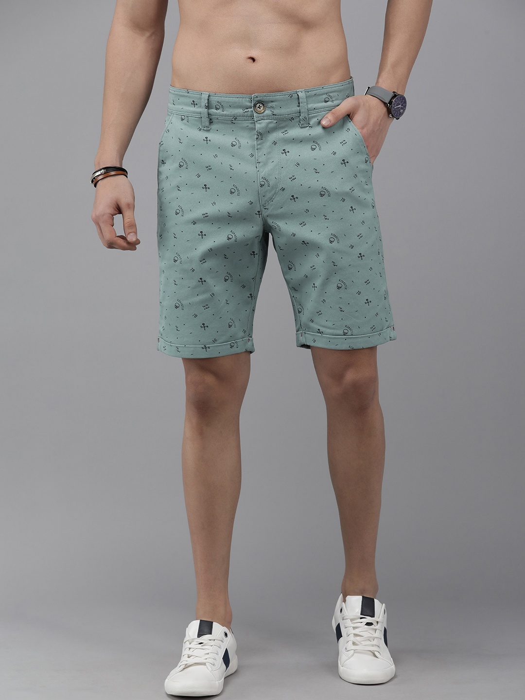 

Roadster Men Turquoise Blue & Black Conversational Printed Regular Fit Chino Shorts