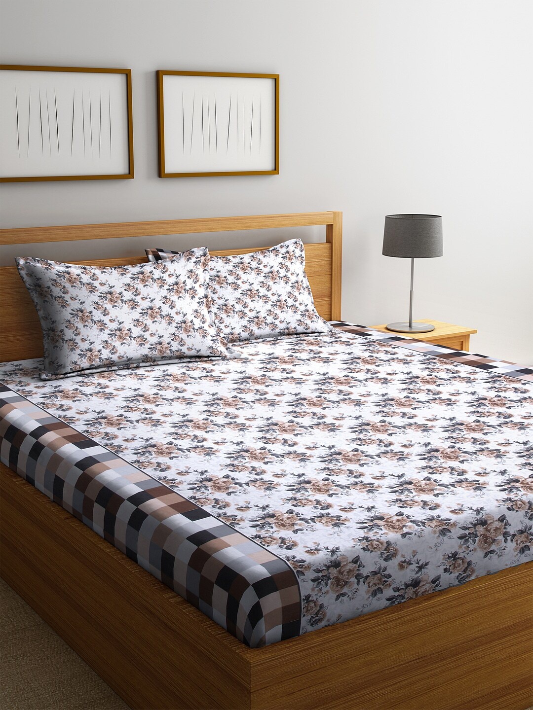 

Cortina Brown & White Floral 104 TC Cotton 1 King Bedsheet with 2 Pillow Covers